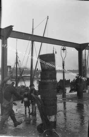 HERRING FISHERY QUAYSIDE JUGGLING TOSSING UP 